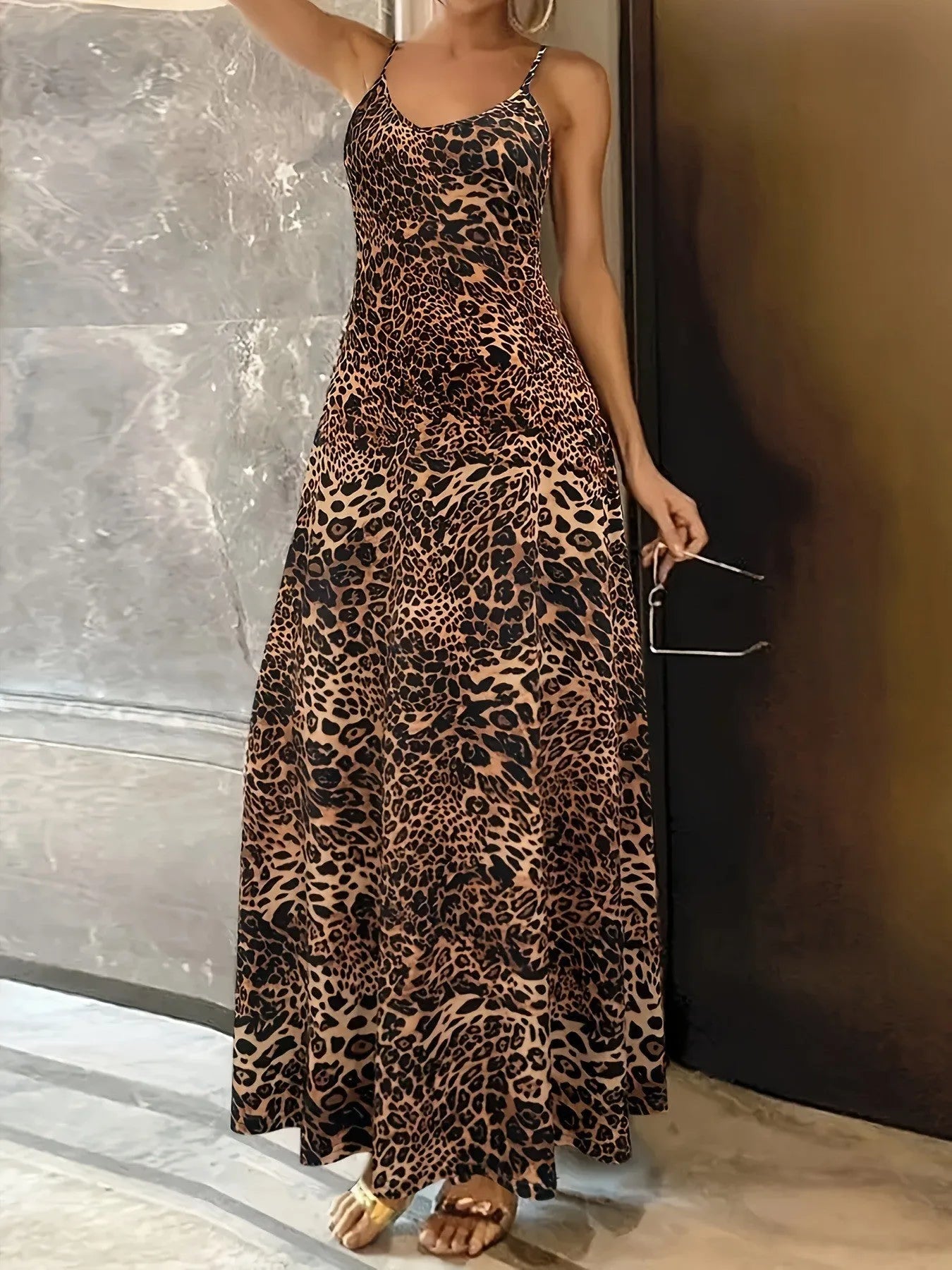 Dark brown leopard print sleeveless dress with round neck and shoulder straps in milk silk polyester fabric