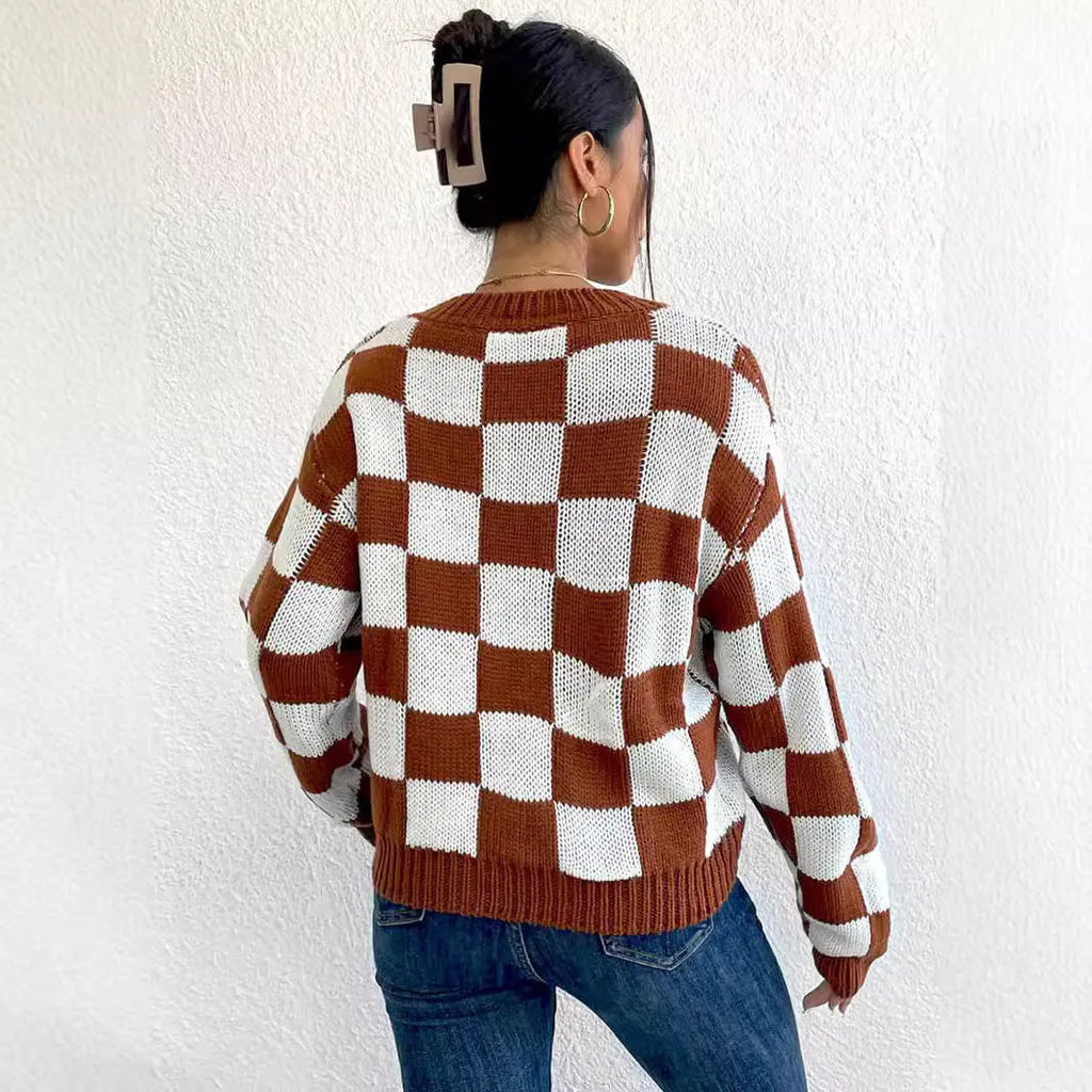 Dark brown plaid pattern acrylic loose pullover sweater with long sleeves and round neck.