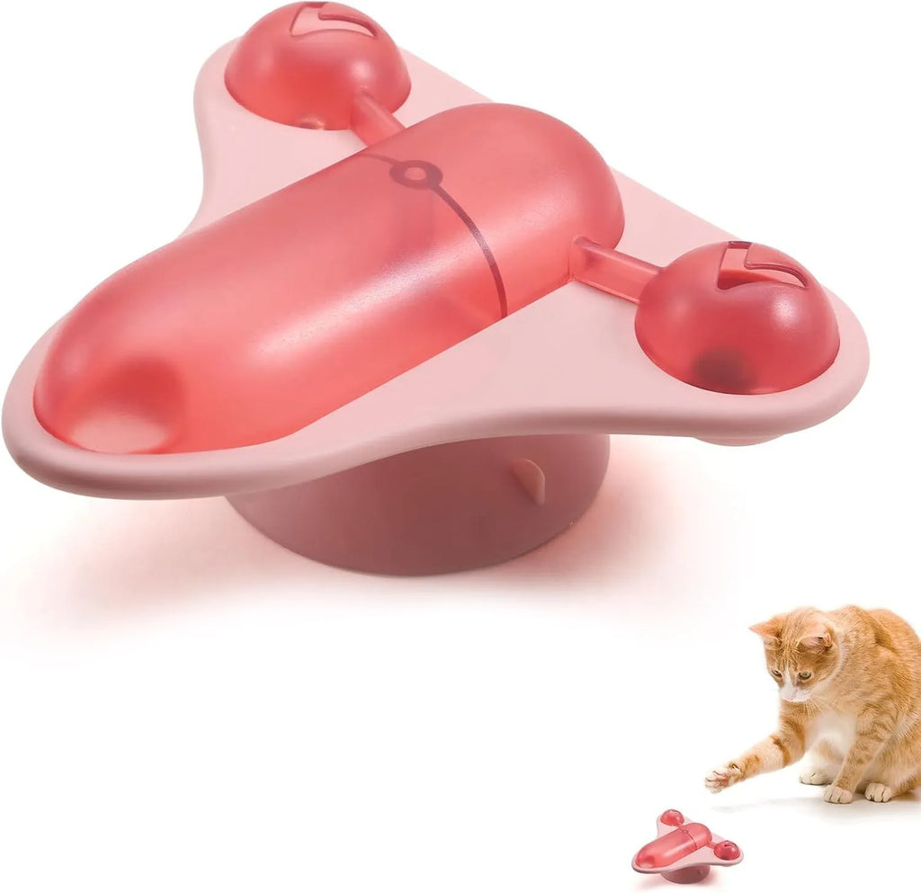 Blue interactive pet puzzle toy with catnip and bell attachments on suction cup base