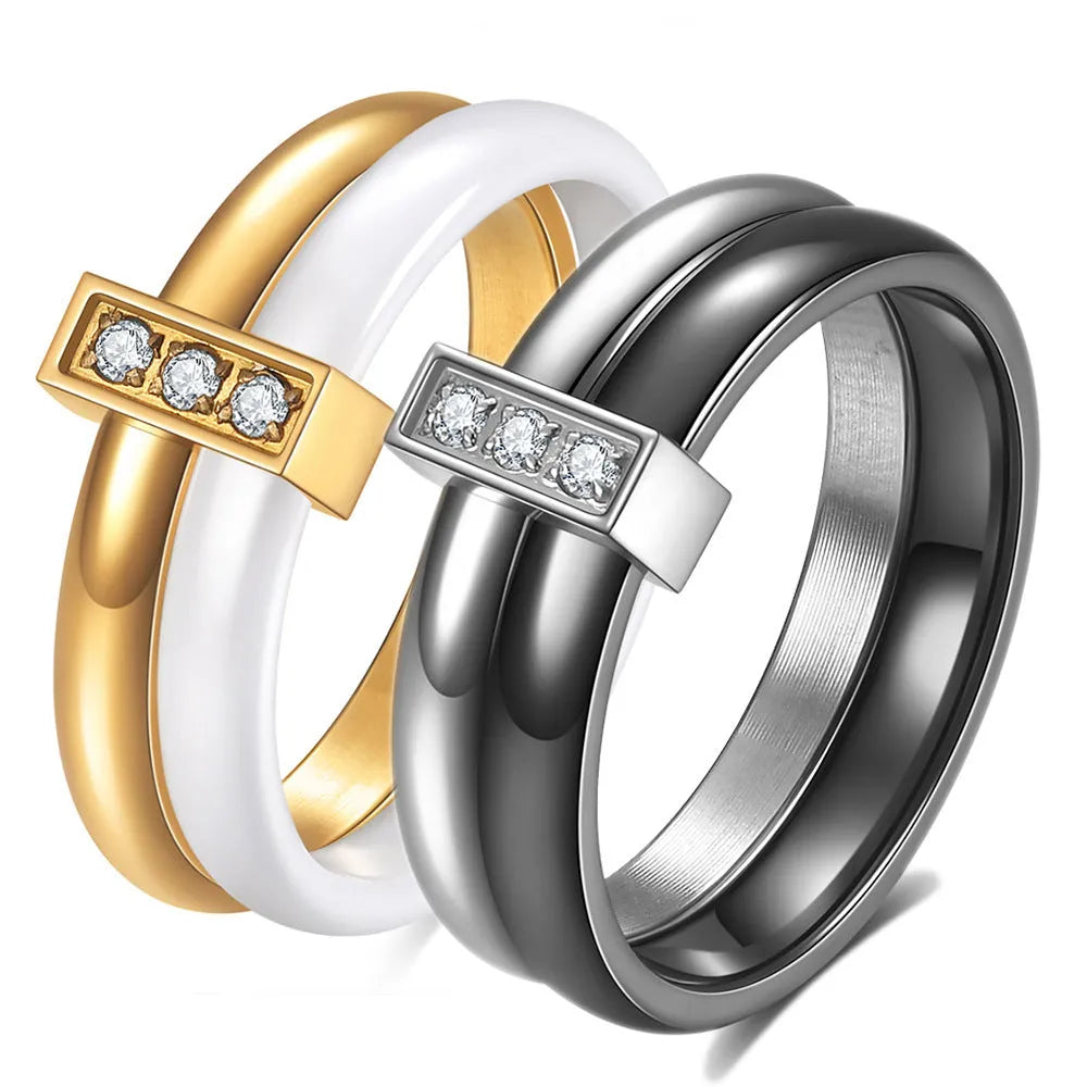 Glossy black ceramic women's ring with a zirconium inlay on a 6mm wide band.