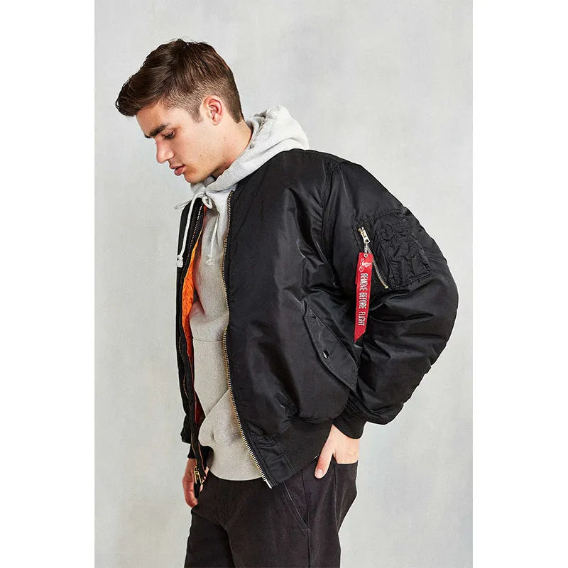 Men's loose fit nylon pilot jacket in Army Green shown on a hanger.
