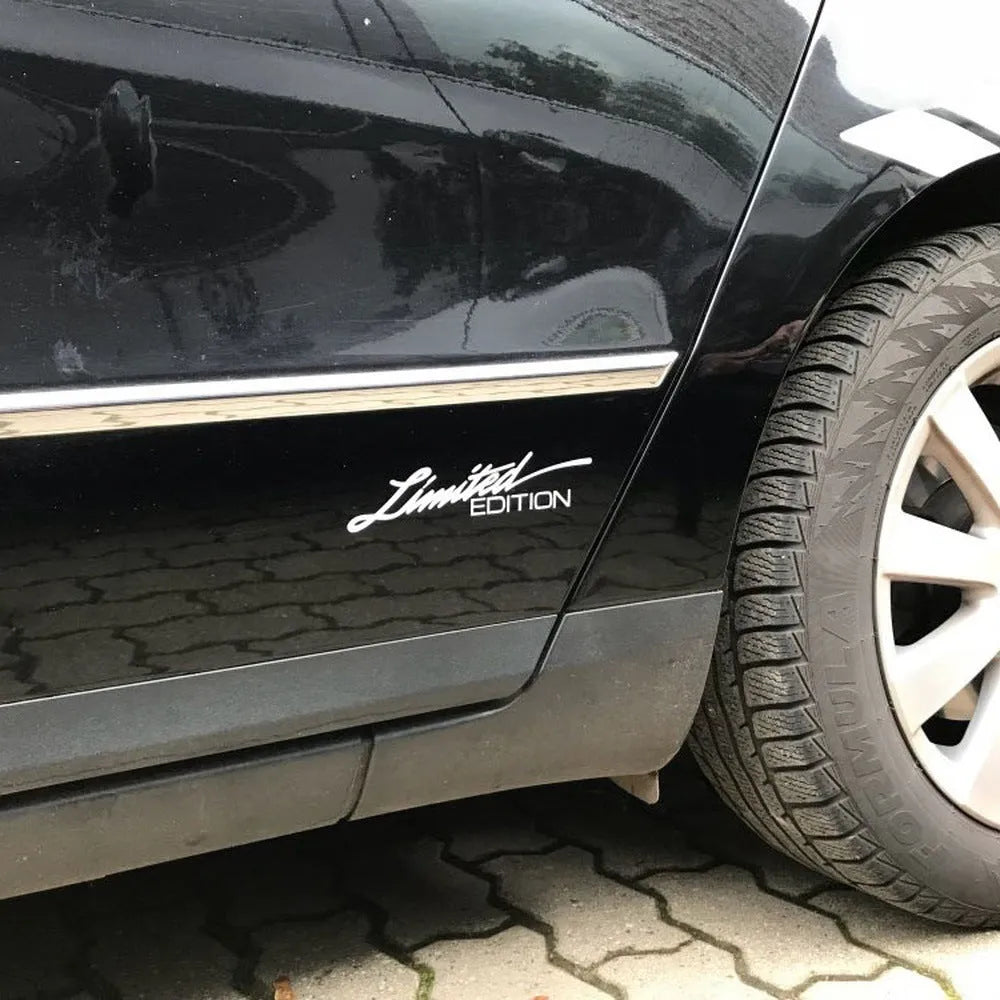 Plastic reflective car bumper sticker measuring 16cm long, shown in black, white, and colourful options.