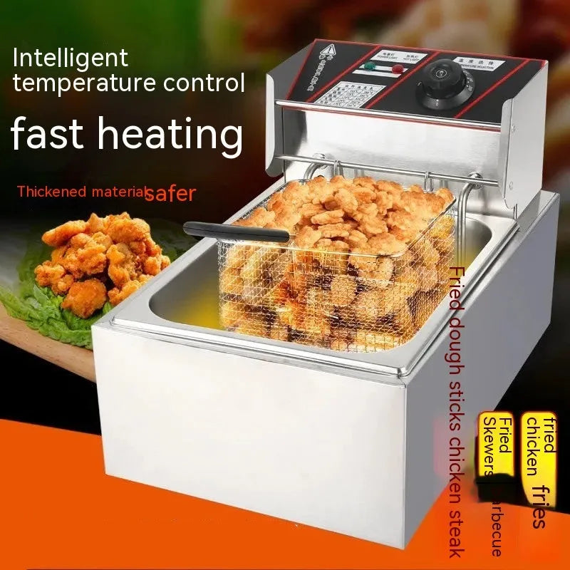 Stainless steel commercial deep fryer with oil tank, lid, and two frying baskets
