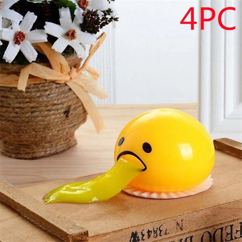 Gudetama Vomiting Egg Toy in green, orange, pink, and yellow
