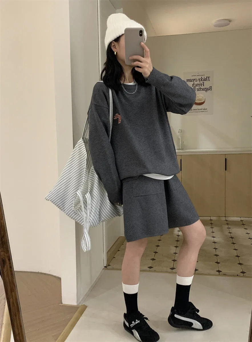 Women's knitted sweater and shorts suit in imitation cashmere with animal embroidery, shown in milk blue.