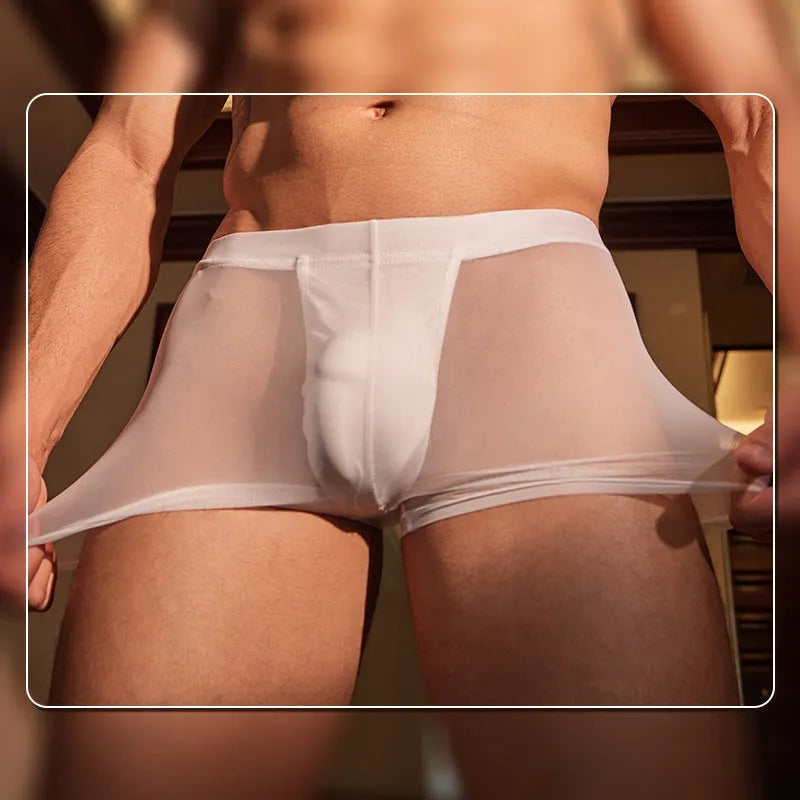 A pair of men's breathable nylon boxer briefs in black, laid flat on a white background.