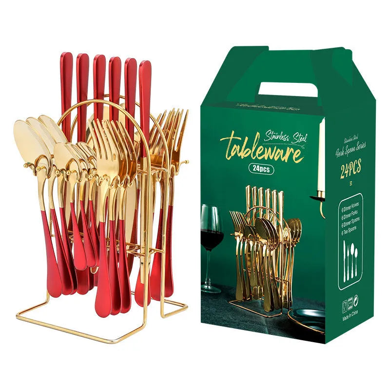 24-piece stainless steel cutlery set with storage rack in gold finish showing knives, forks, spoons