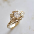 Gold alloy unisex ring with brushed finish on white background