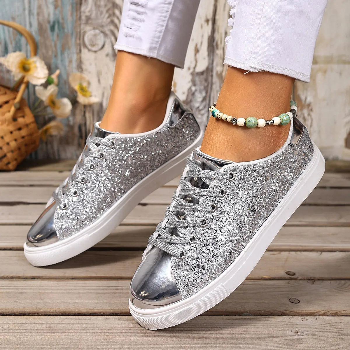 Women's plus size black sequined lace-up board shoes with a flat heel and round toe on a white background