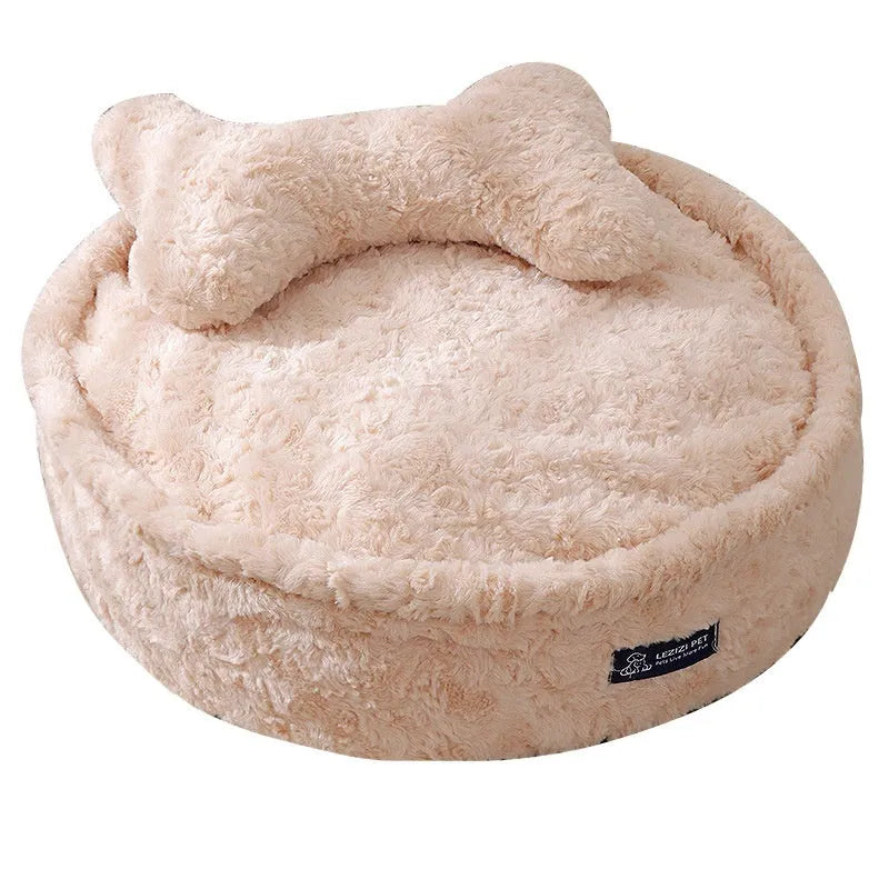 Milk tea colour round pet bed with a removable cloth cover on a wooden floor.