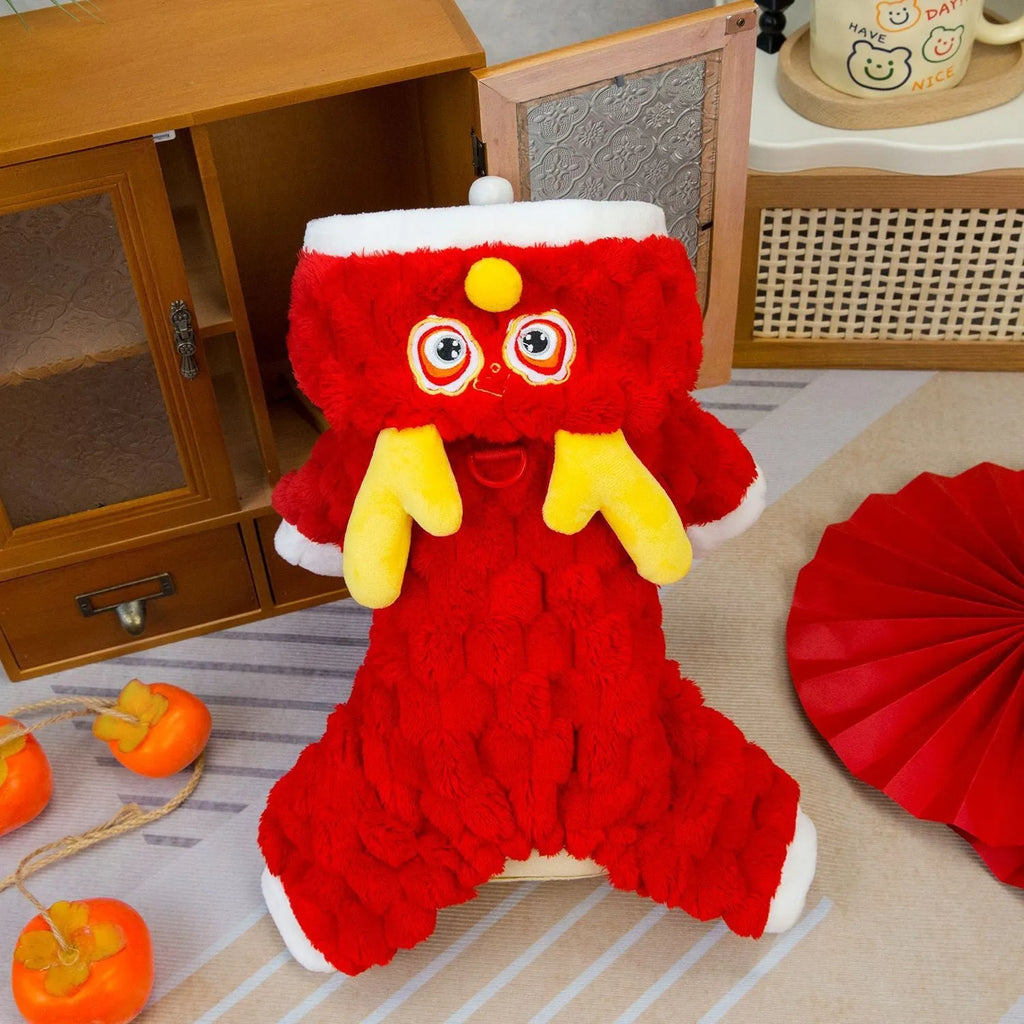 Red fluffy pet jacket with cartoon dragon design for small dogs and cats on a white background.