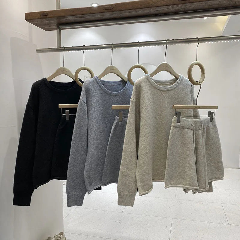 Women's loose-fit acrylic knit sweater and wide-leg shorts co-ord set in oatmeal colour.