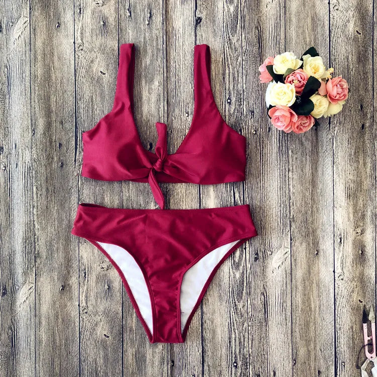 Women's polyester bikini set in black, pink, red, white or wine red with matching bra and panties