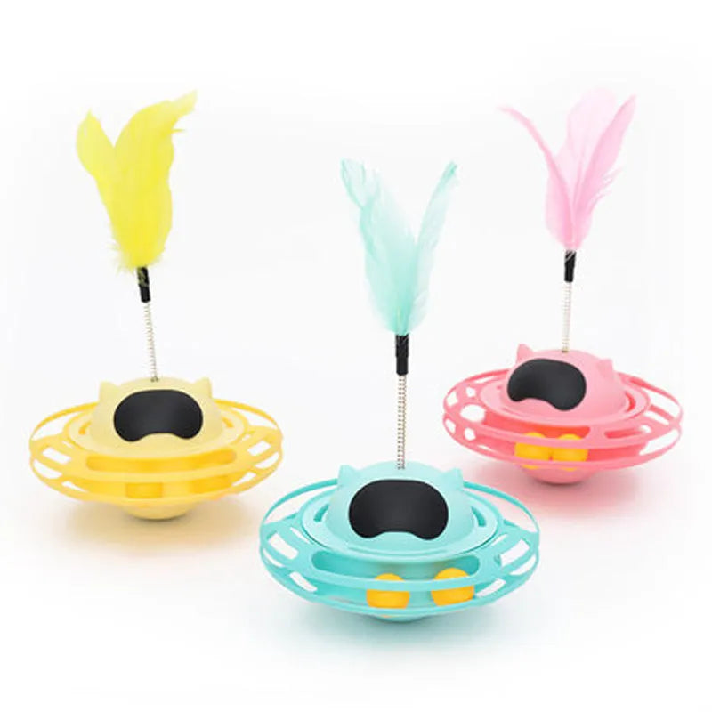 Pink cat tumbler turntable toy measuring 17 cm by 10 cm on a flat surface
