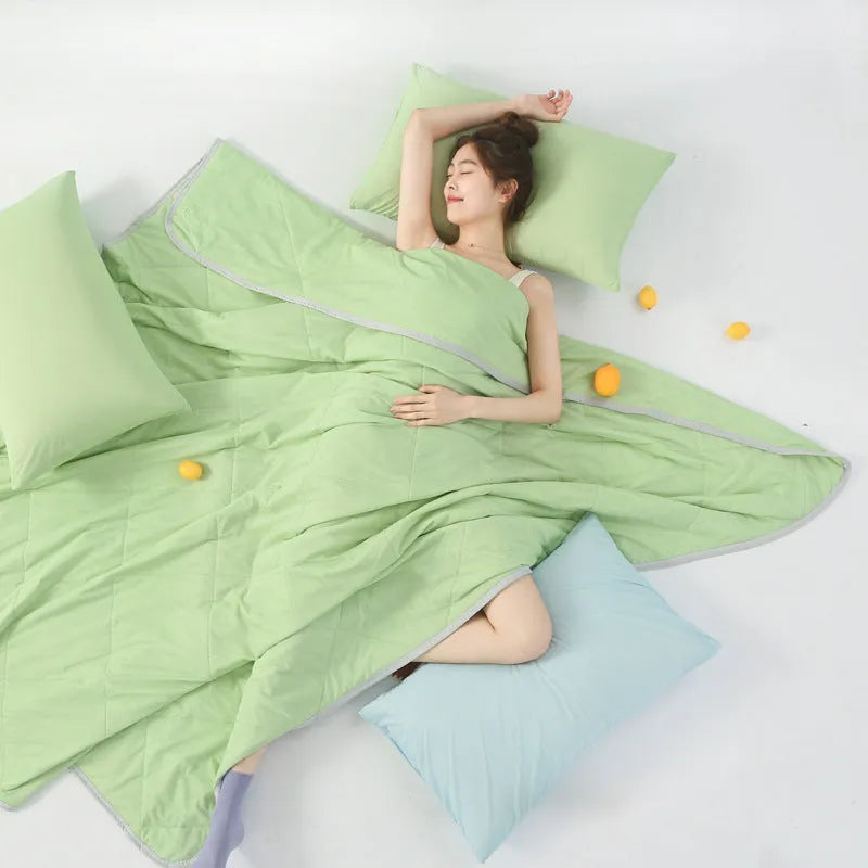 Class A Cool Silk Watermelon Quilt in cool fibre fabric with polyester filler, available in solid colours and multiple sizes