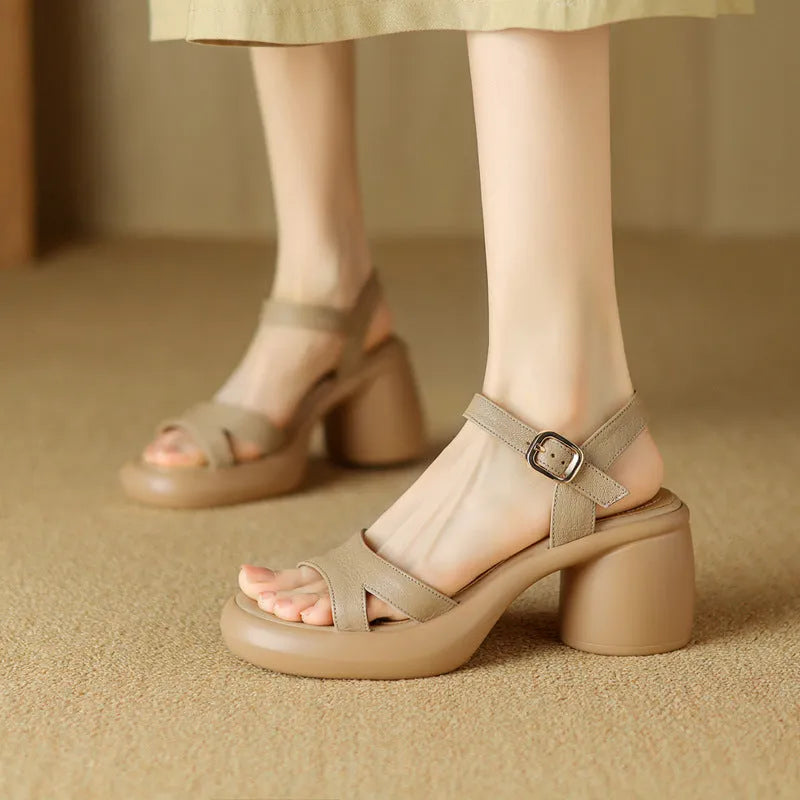 Women's apricot open toe platform sandals with an adjustable strap on a white background.