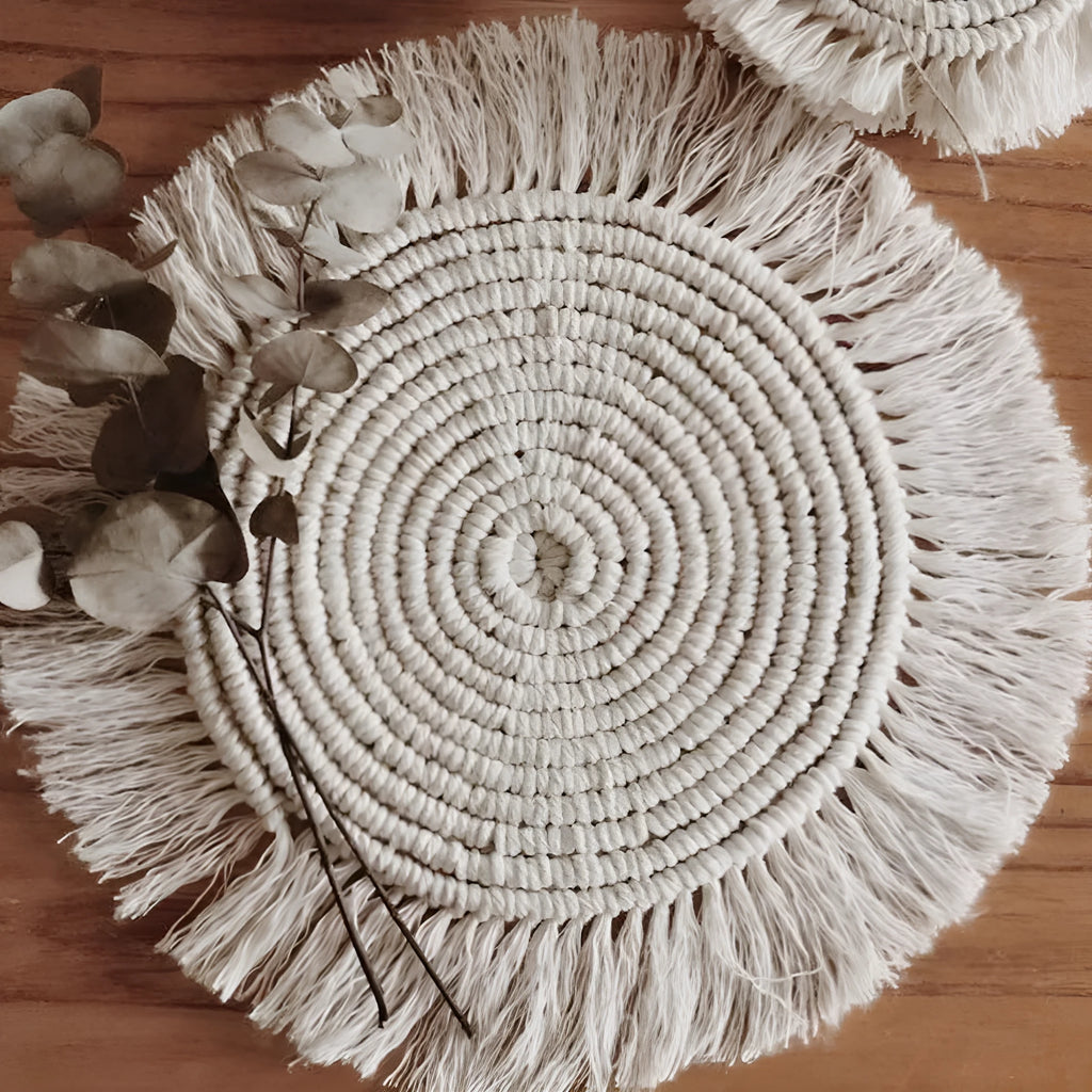 Hand-woven round beige cotton string coaster on a wooden surface, 15x15cm size option