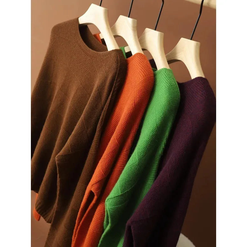 Seamless loose knit pullover jumper in green, front view