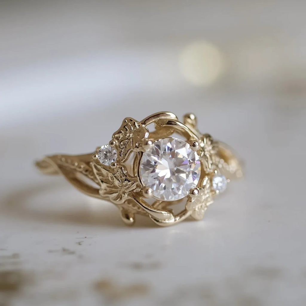 Gold alloy unisex ring with brushed finish on white background