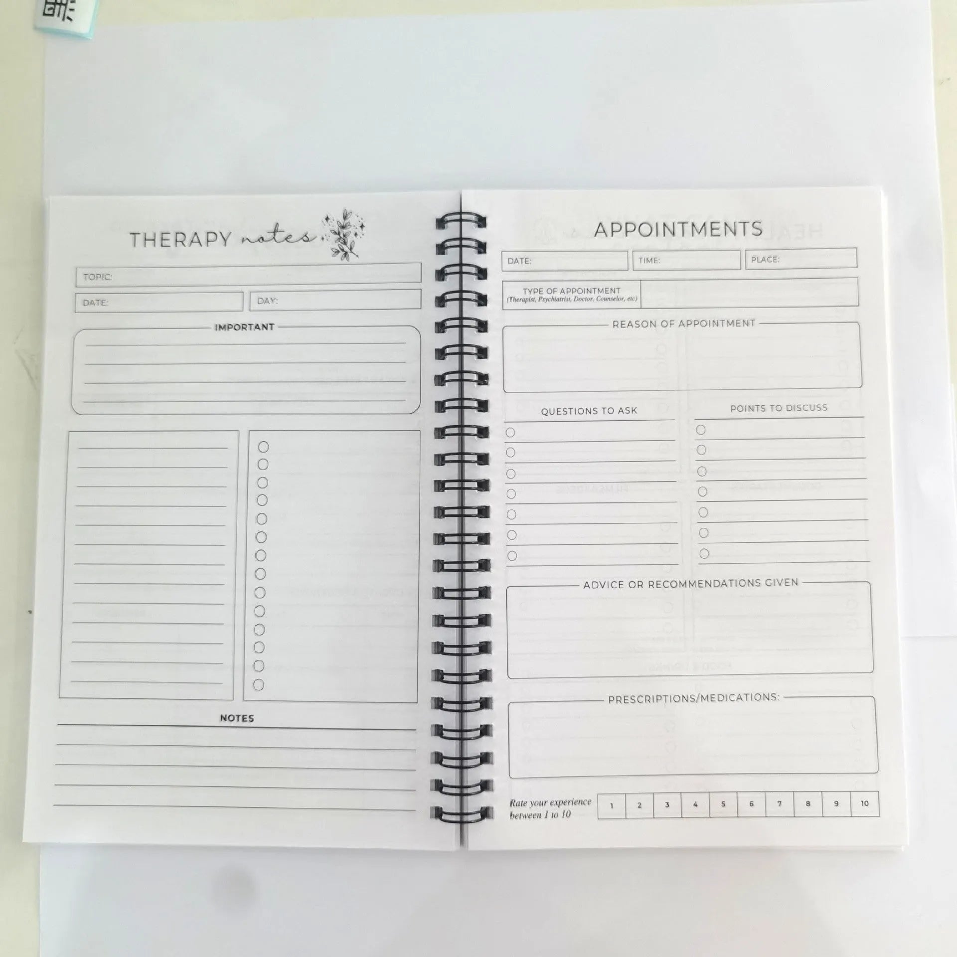 Pink brain mental health planning notepad with coil binding, A5 size, paper cover