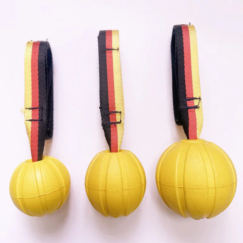 Camouflage and yellow EVA floating dog tetherball toys with string in 6.5cm, 7cm, and 9cm sizes.