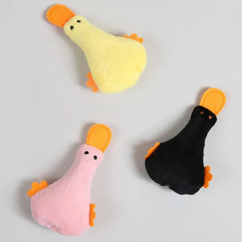 Colourful plush duck pet toy with squeaker and catnip filling for dogs and cats.