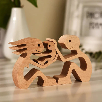 Handcrafted wooden dog sculpture featuring a man and his loyal canine companion