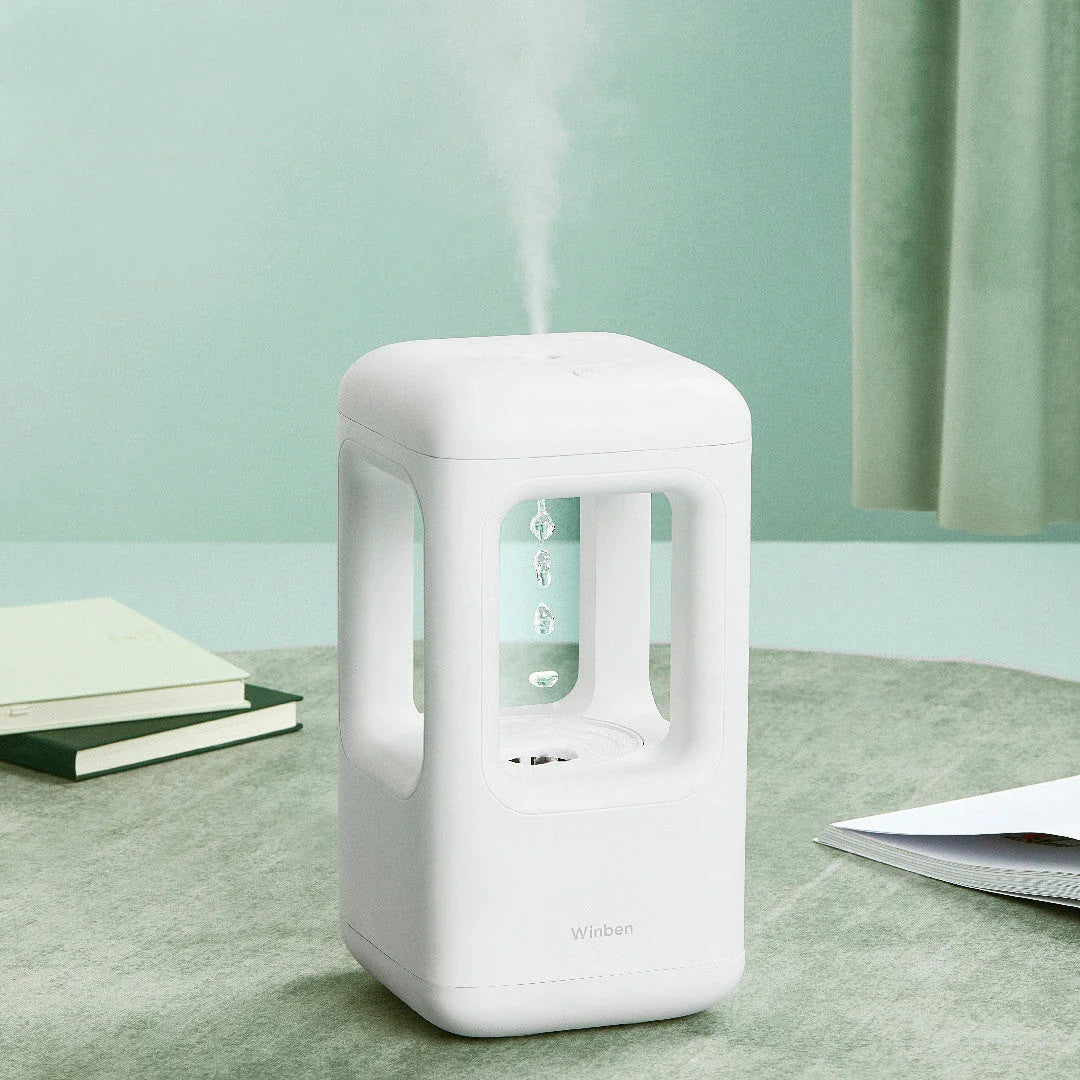 Whisper-quiet humidifier with captivating water drop effect, designed for optimal air quality and soothing ambiance in the bedroom