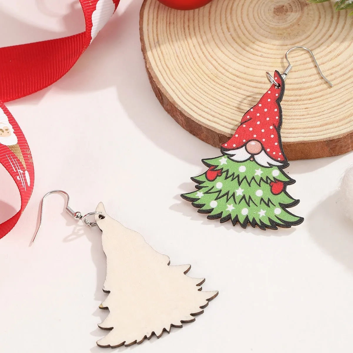 Wooden Christmas earrings with printed geometric tree and snowman designs