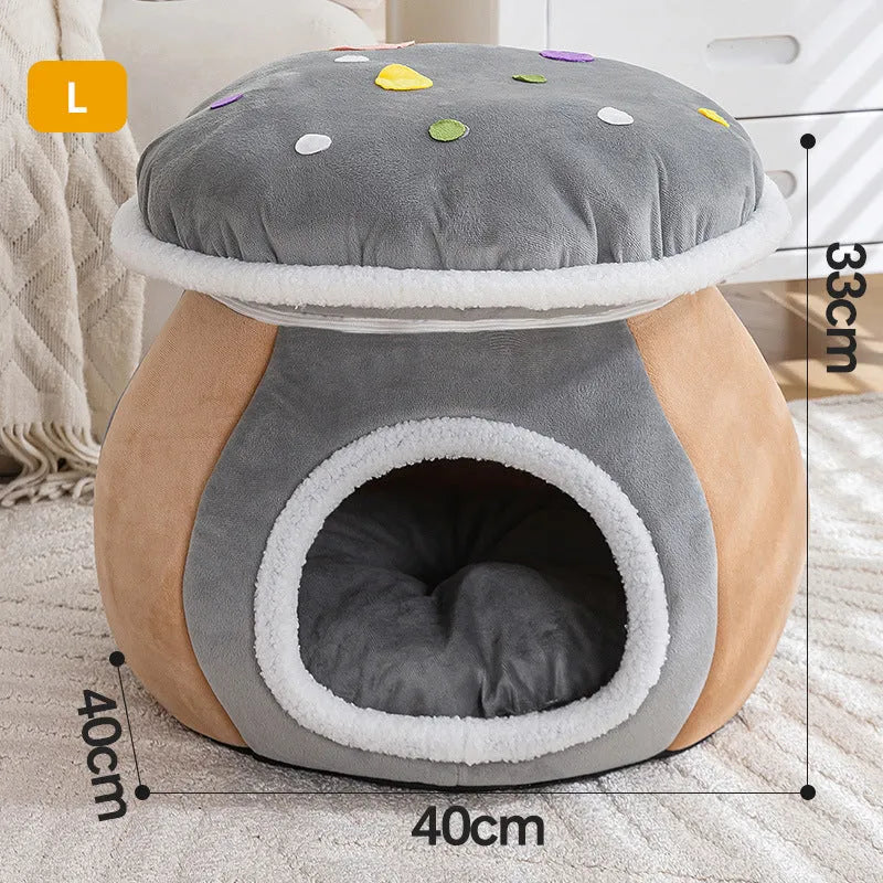 Grey mushroom-shaped plush cat bed with a detachable blanket, shown in a domestic setting.