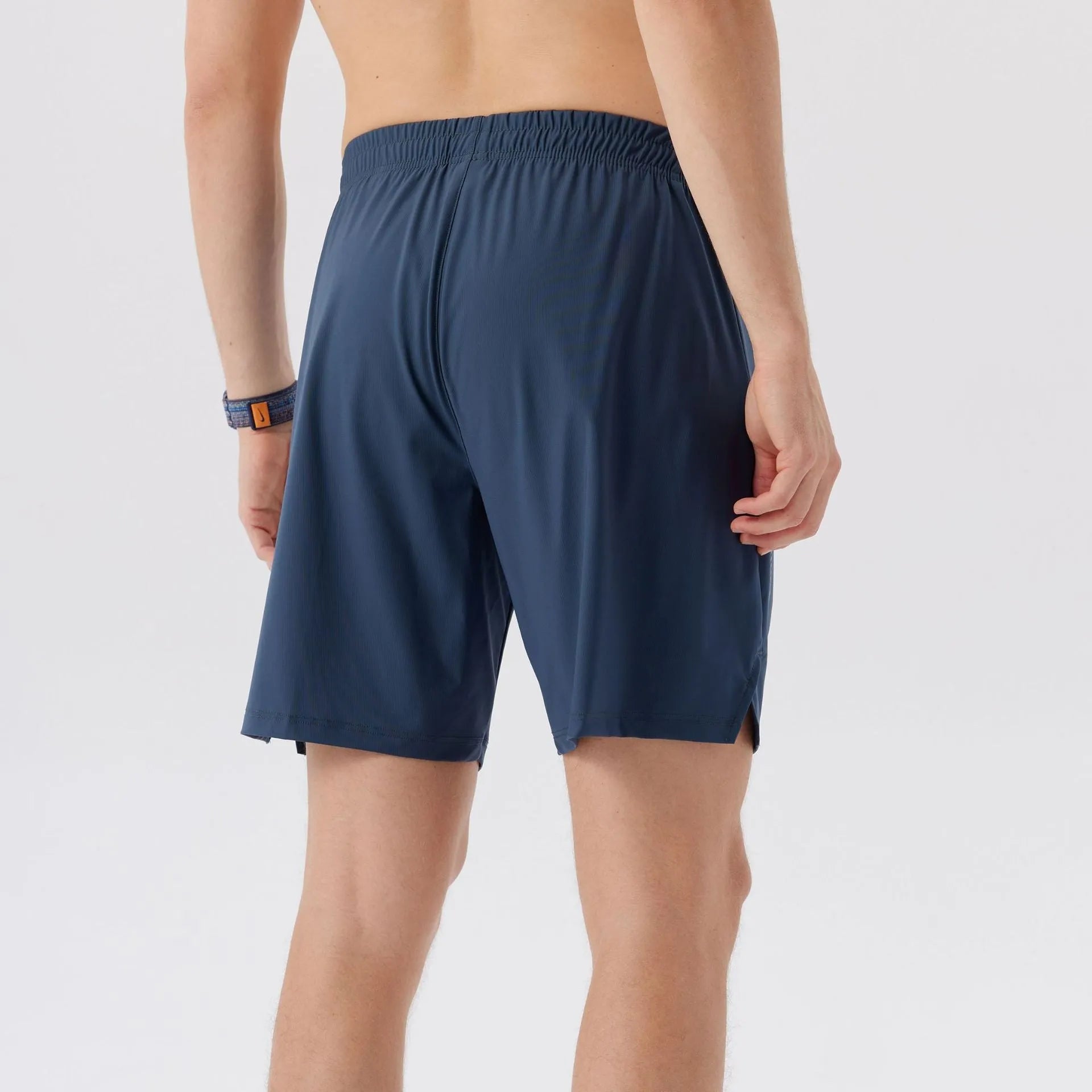 Men's ice silk nylon sports shorts in black, shown in a mid-waist, shorts-length style.