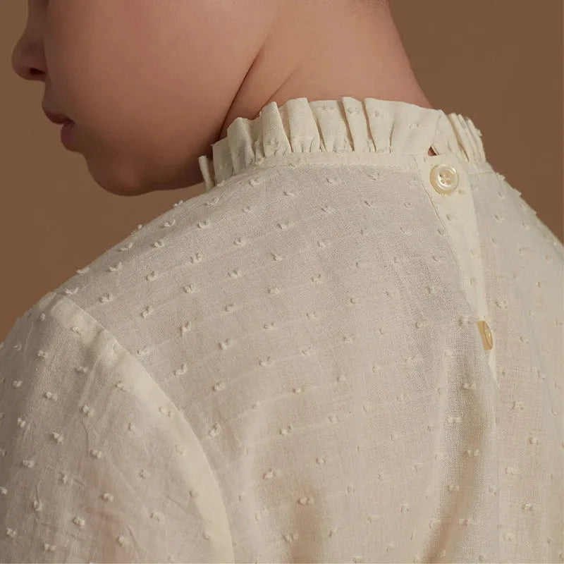 Girls cotton long sleeve polka dot top with lace trim, light apricot colour, spring clothing