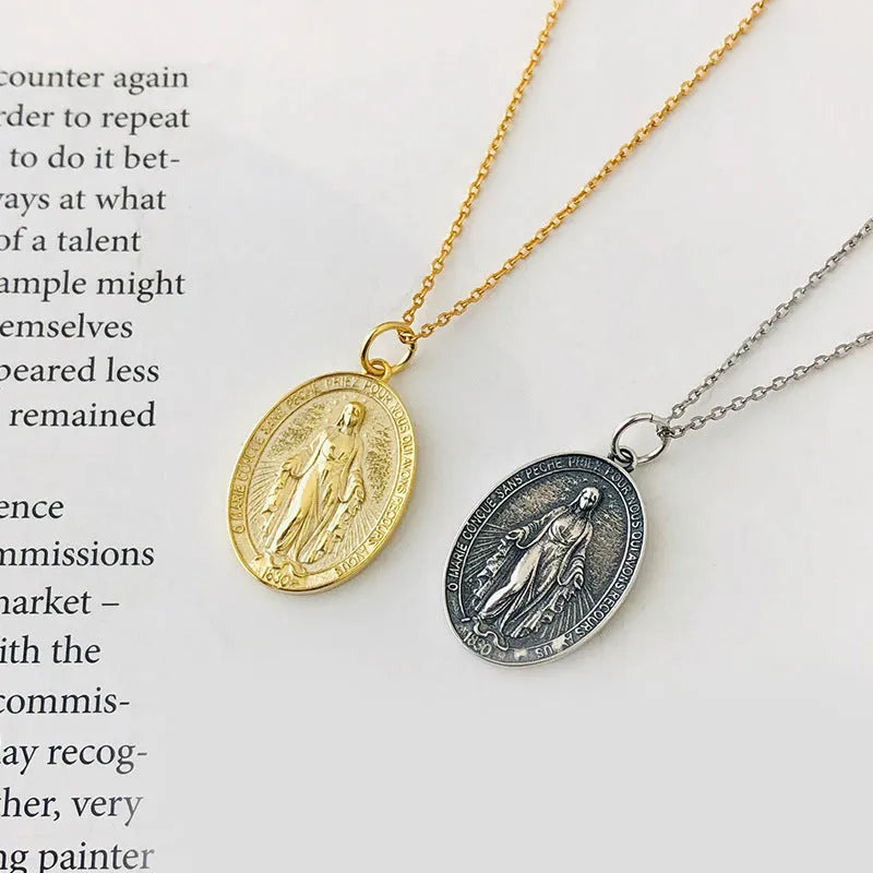 S925 sterling silver vintage embossed portrait coin-style pendant in gold finish on white background