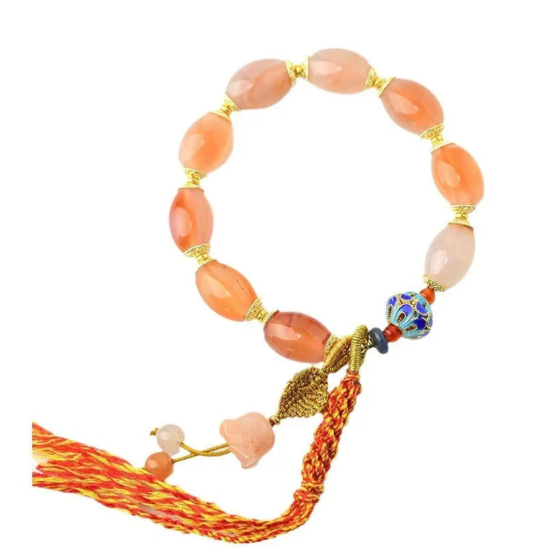 Jinsi jade agate Tibetan bracelet with carved lily flower motif and geometric shapes