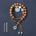 Hand-woven ebony wood bracelet with gemstone elements in double ring national style design