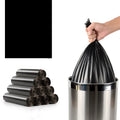 Roll of large black thickened plastic kitchen bin bags, 50cm by 60cm with flat-mouth opening