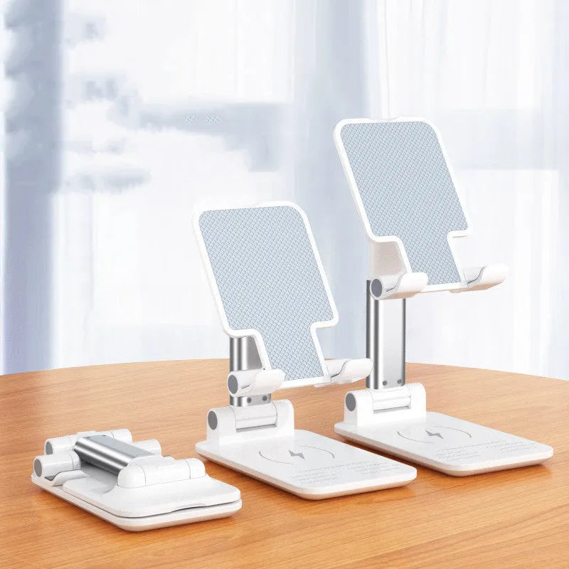 Black desktop wireless charging phone holder standing upright with a mobile phone on it.