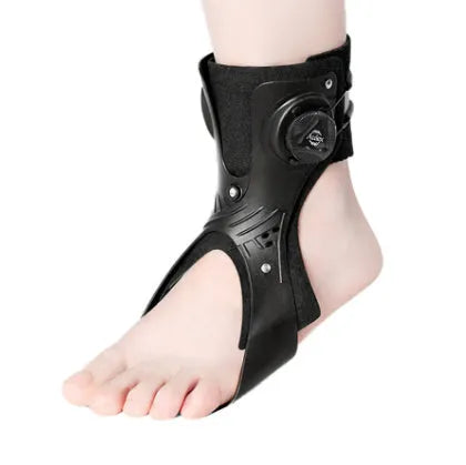 Adjustable ankle fixation brace with airbag button in black or grey colour, shown on a foot.