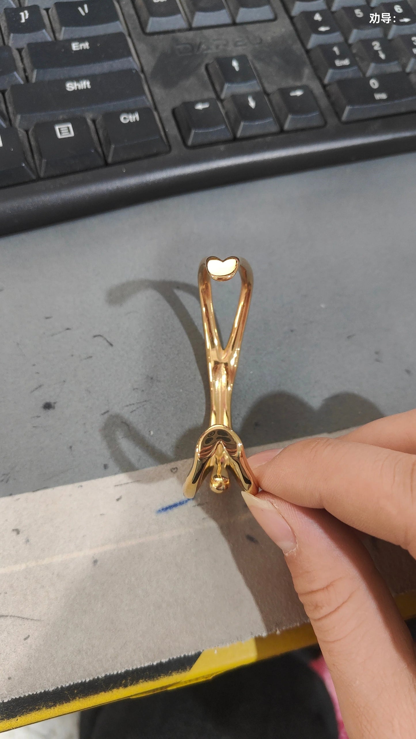 Gold plated stainless steel bracelet with creative female body design