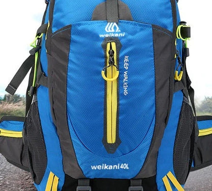 Green 40L hiking backpack with adjustable chest strap and multiple compartments for outdoor sports