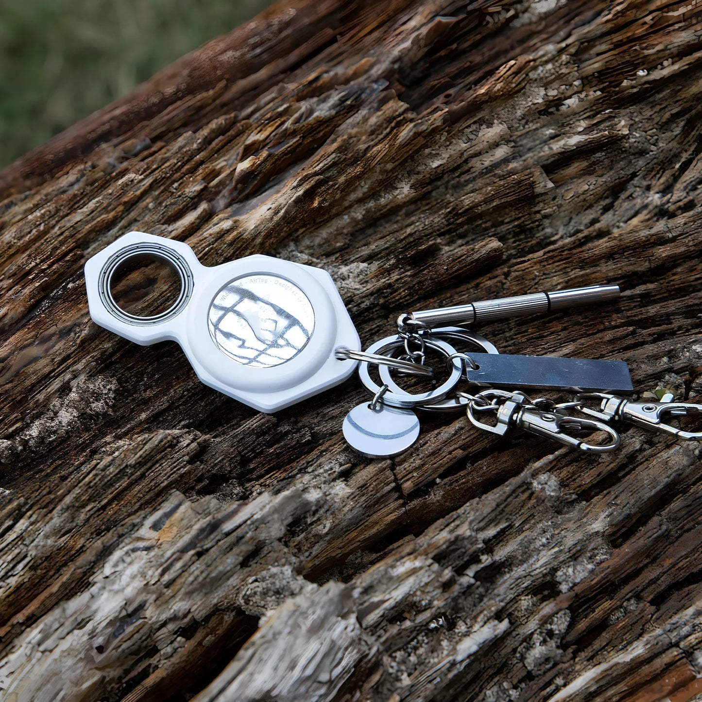 White zinc alloy Apple AirTag keychain case with protective cover and swivel keyring