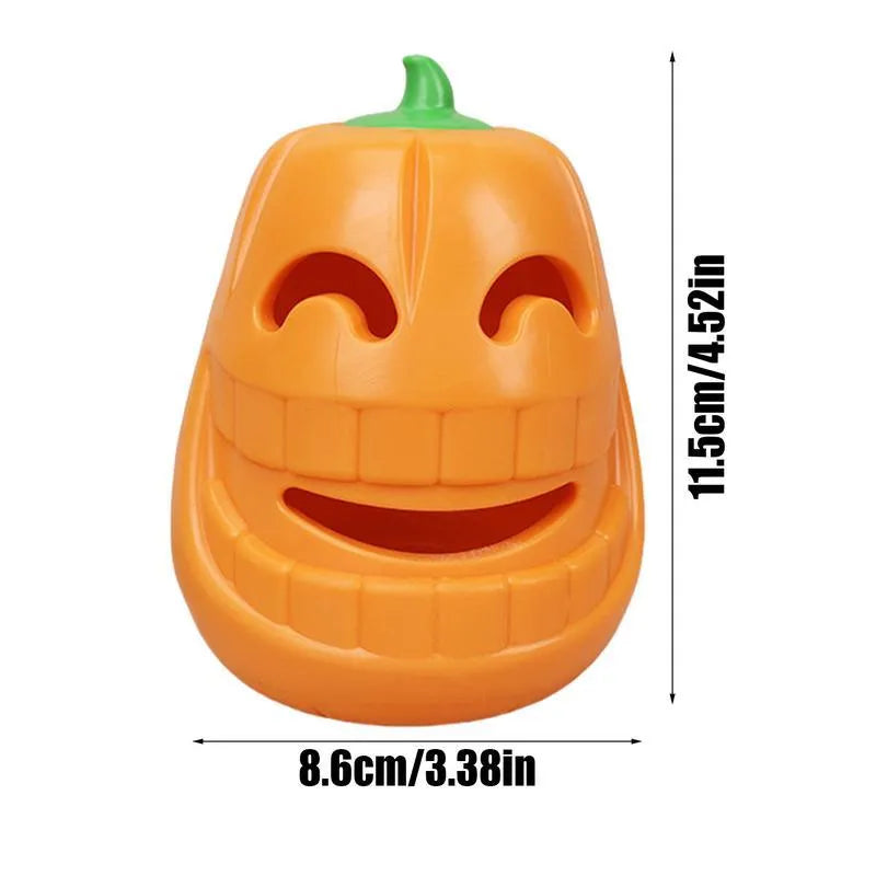 Yellow pumpkin-shaped TPR dog chew toy for aggressive chewers on a white background.