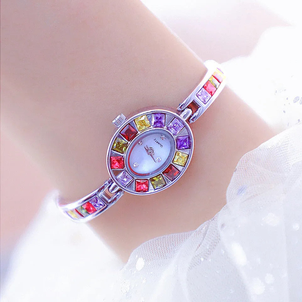 Women's small dial quartz watch with Austrian rhinestones in gold alloy finish