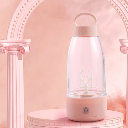 Automatic electric shaker bottle in cream white, peach pink, and new branch green with USB charging