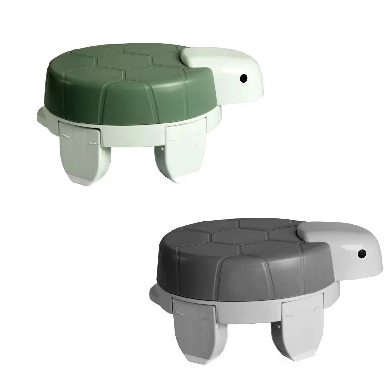 Children's portable folding training toilet with cute turtle design, ideal for potty training at home or on the go.