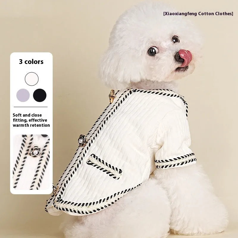 Quilted polyester dog coat with cartoon pattern in light purple colour on medium-sized dog