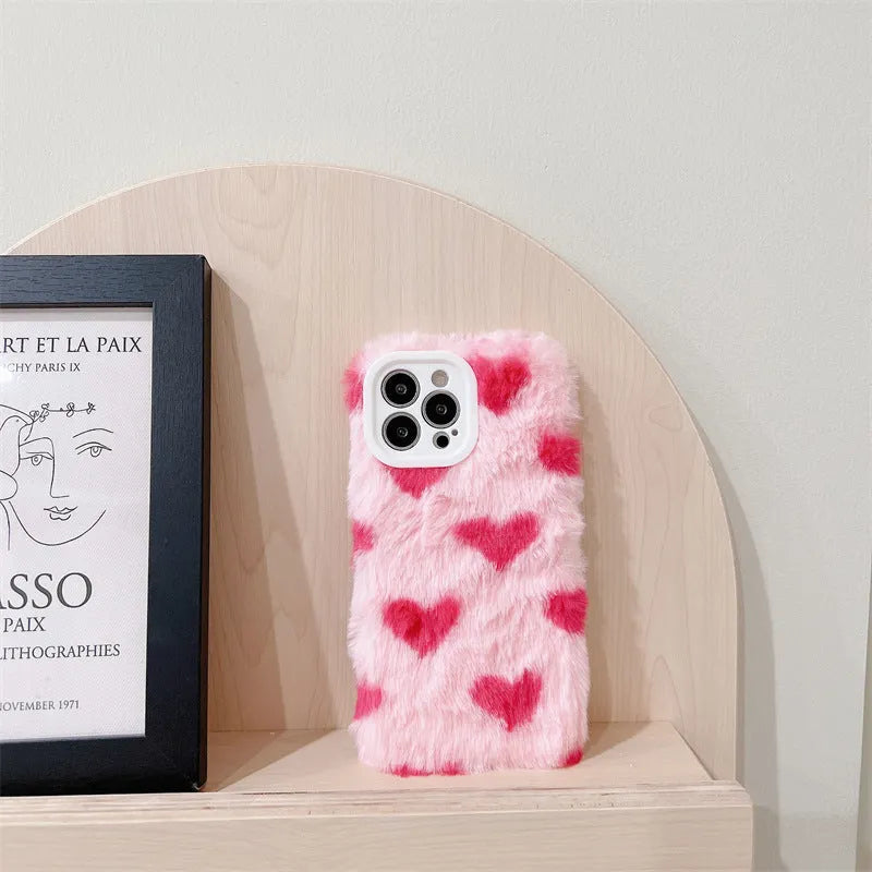 Pink silicone phone case with a cartoon design, shown fitted on an Apple iPhone.