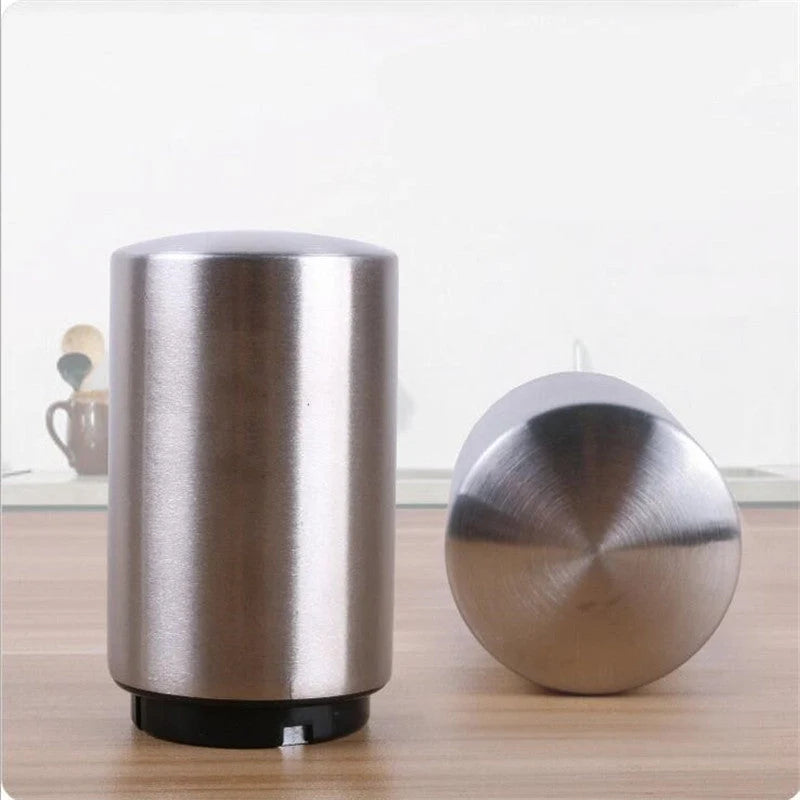 Stainless steel magnetic beer bottle opener with brushed metal finish