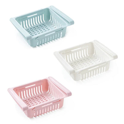 Stretchable refrigerator storage basket in white, blue, pink, and apricot colours