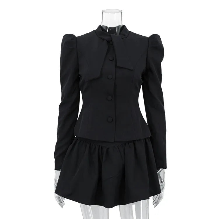 Women's gray bow tie long sleeve suit top and short skirt two-piece set on model